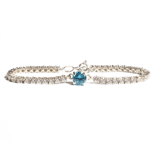 Elegant Silver Tennis Bracelet with Blue Crystal Centerpiece